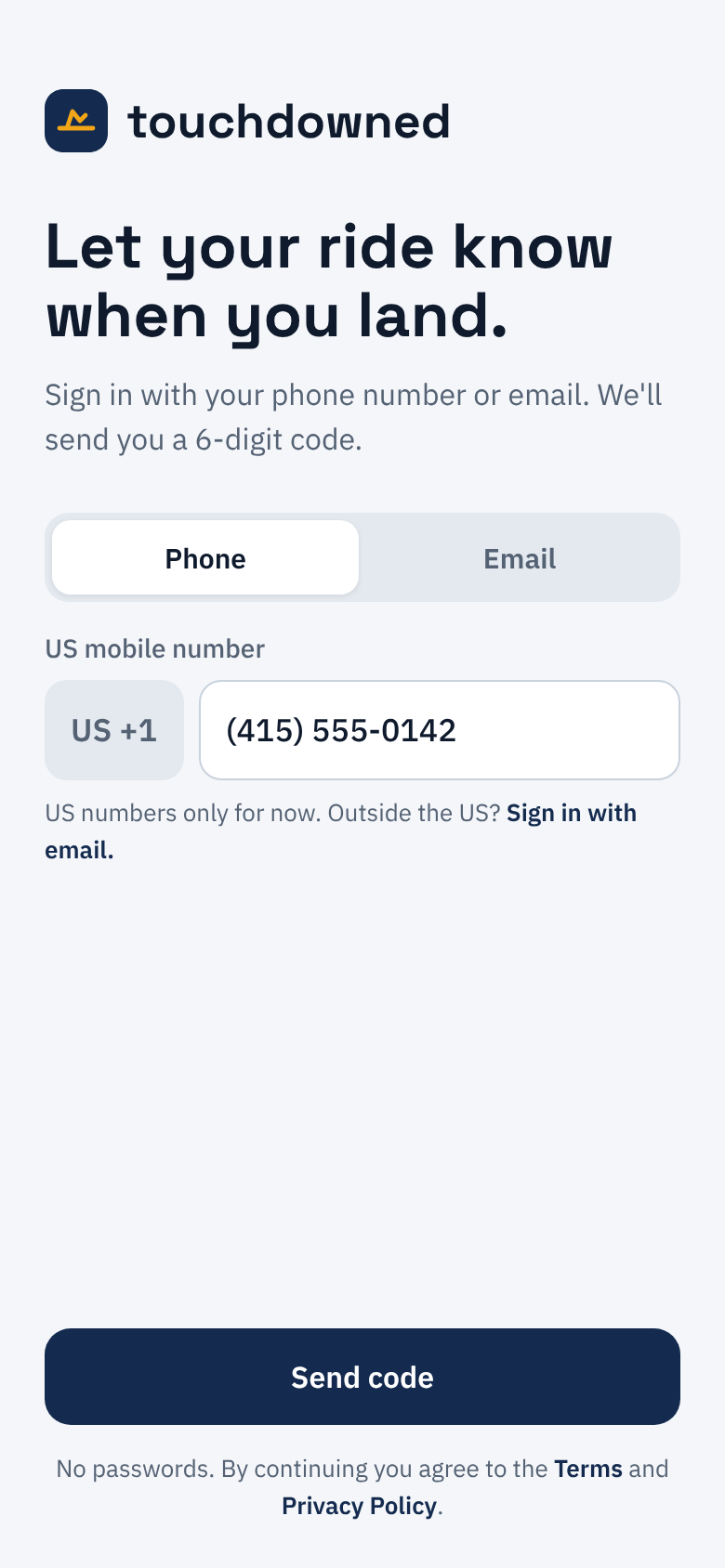 The touchdowned sign-in screen with the Phone tab selected: a US mobile number field, a Send code button, and the line No passwords. By continuing you agree to the Terms and Privacy Policy, with both linked.